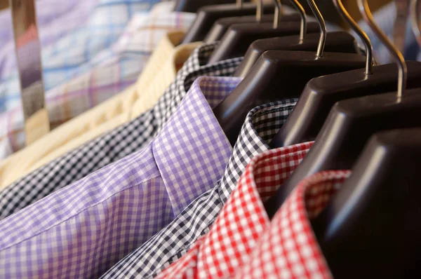 Mens shirts on rack